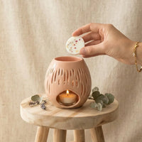 bruleur à fondant galet parfumé en céramique terracotta