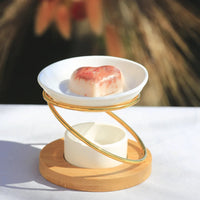 bruleur à fondant galet parfumé en métal et céramique blanc