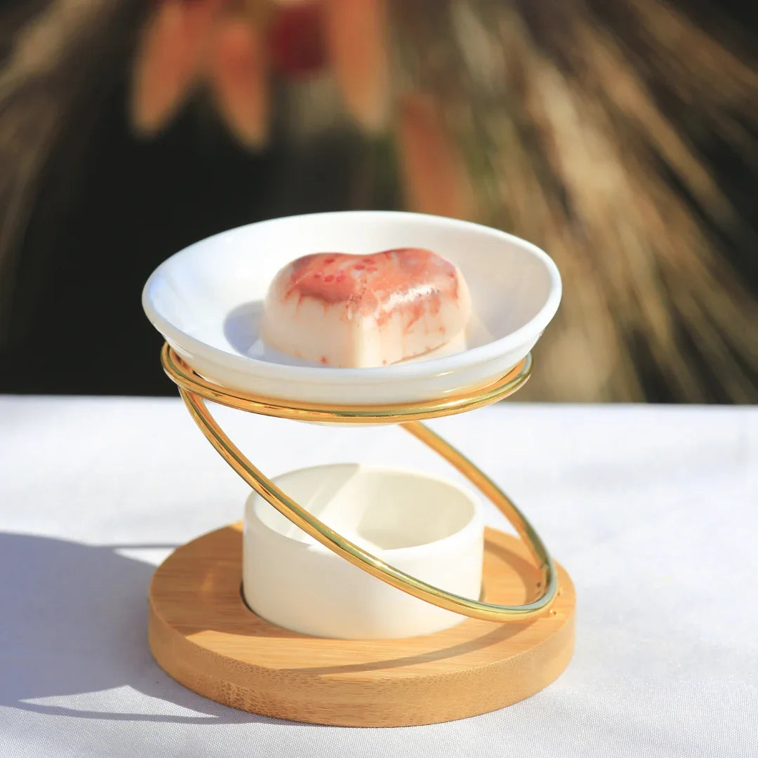 bruleur à fondant galet parfumé en métal et céramique blanc