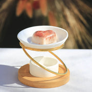 bruleur à fondant galet parfumé en métal et céramique blanc